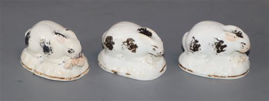 Three rare Staffordshire porcelain figures of rabbits, c.1835-50, length 4.5cm - 5cm